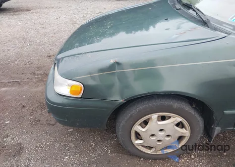 2000 Toyota Corolla Le from USA, damaged, VIN 2T1BR12E2YC309516